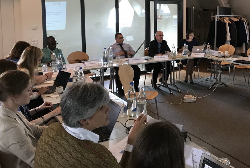 Peer learning workshop with people sitting at desks