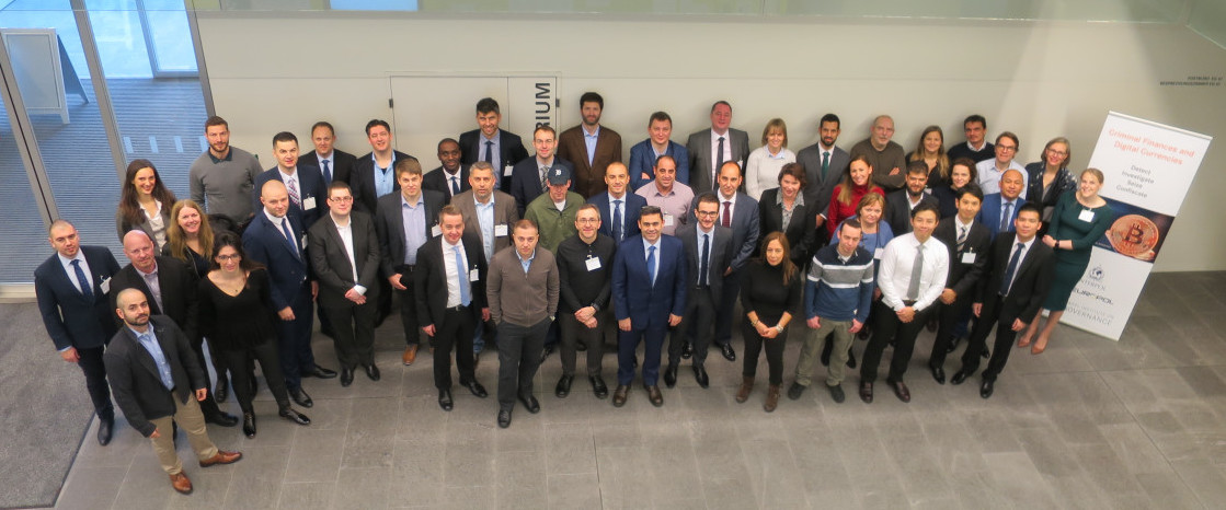 Group of participants in cryptocurrency workshop