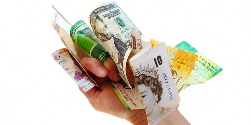 Hand holding a wad of cash