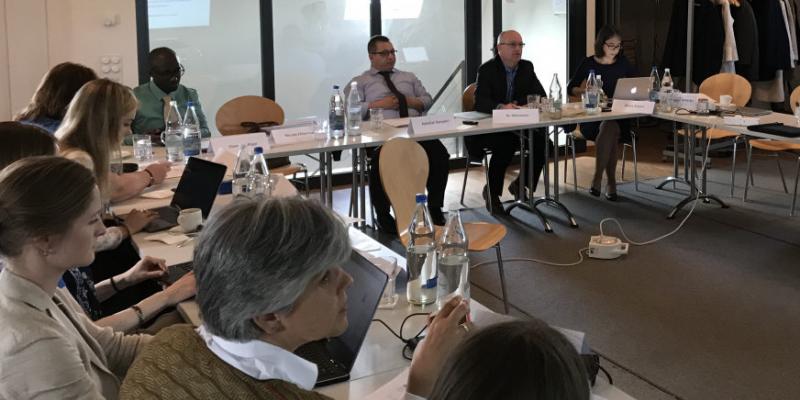 Peer learning workshop with people sitting at desks