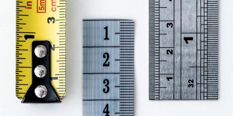 Measuring sticks. Photo by William Warby on Unsplash.